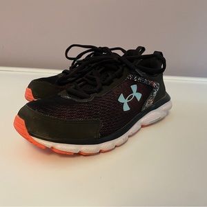Under Armour sneakers.